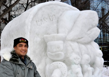 2014 Navy Misawa Snow Team completes 'Fighting Bee' snow sculpture