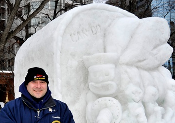 2014 Navy Misawa Snow Team completes 'Fighting Bee' snow sculpture