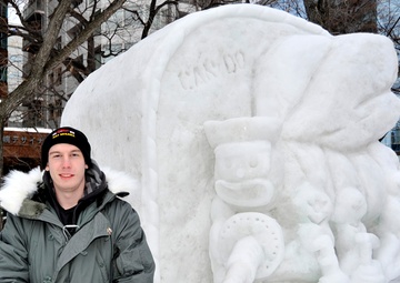 2014 Navy Misawa Snow Team completes 'Fighting Bee' snow sculpture