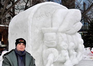 2014 Navy Misawa Snow Team completes 'Fighting Bee' snow sculpture