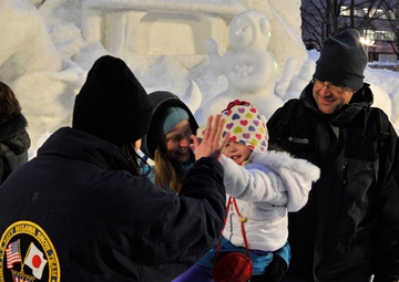 2014 Navy Misawa Snow Team completes 'Fighting Bee' snow sculpture