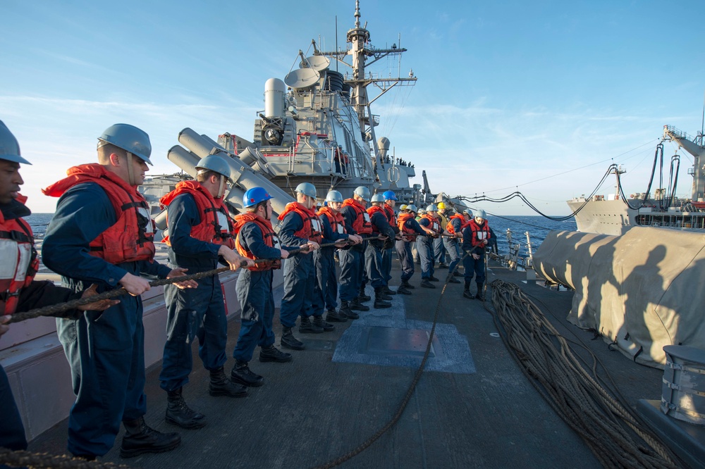 Sailors heave a line