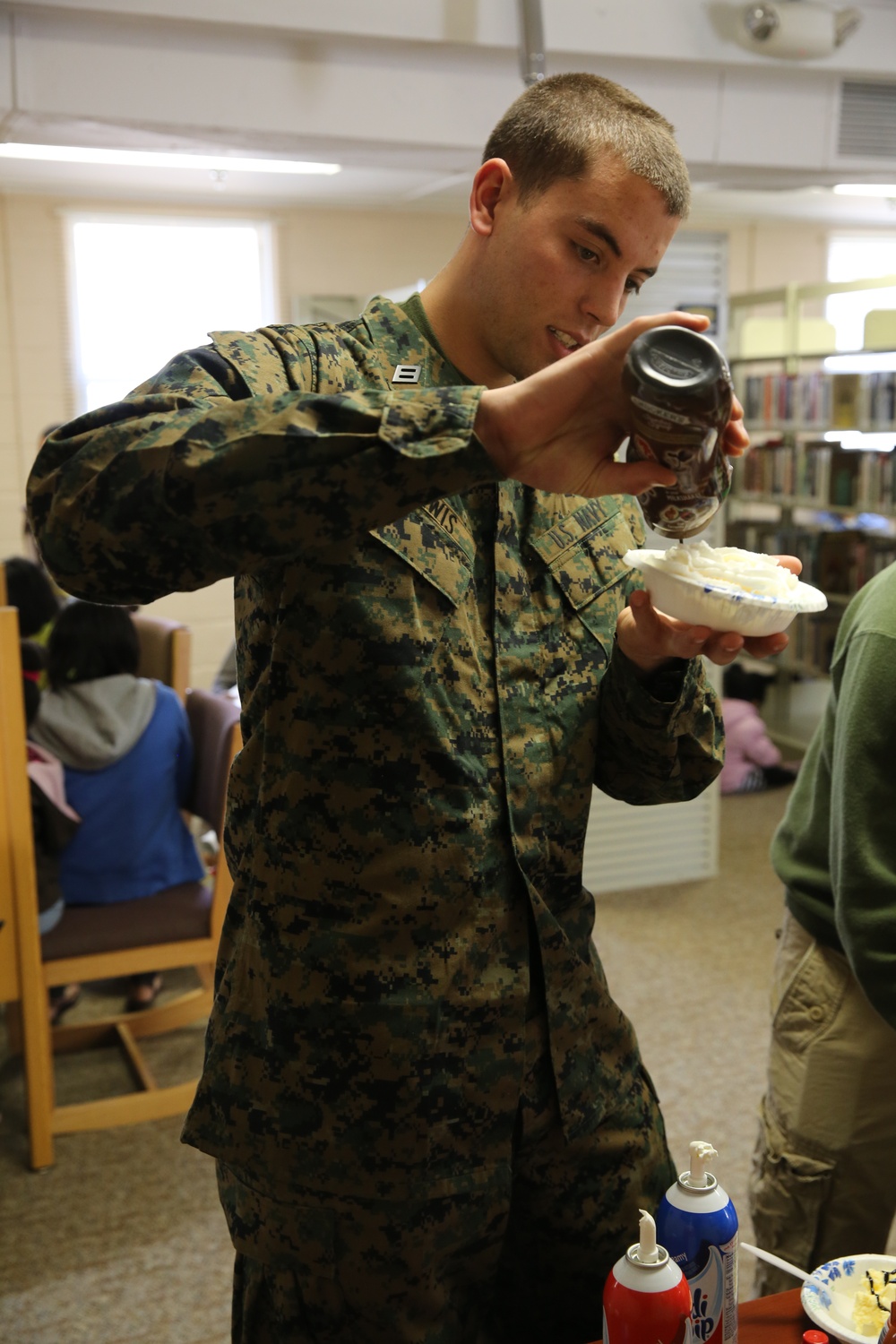 Sundaes on Sunday draws families to Camp Johnson Library