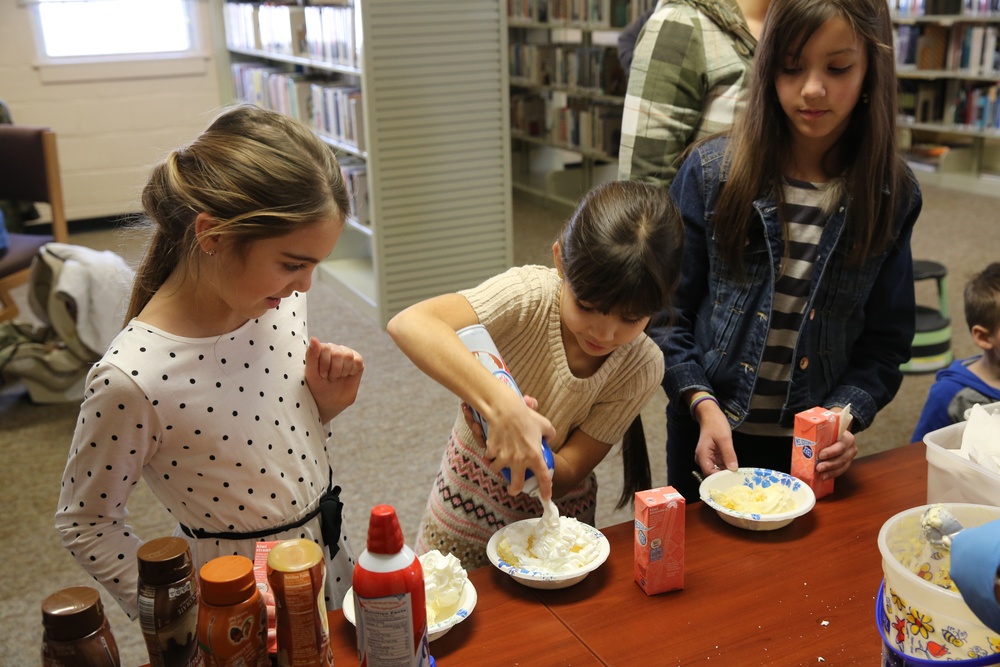 Sundaes on Sunday draws families to Camp Johnson Library