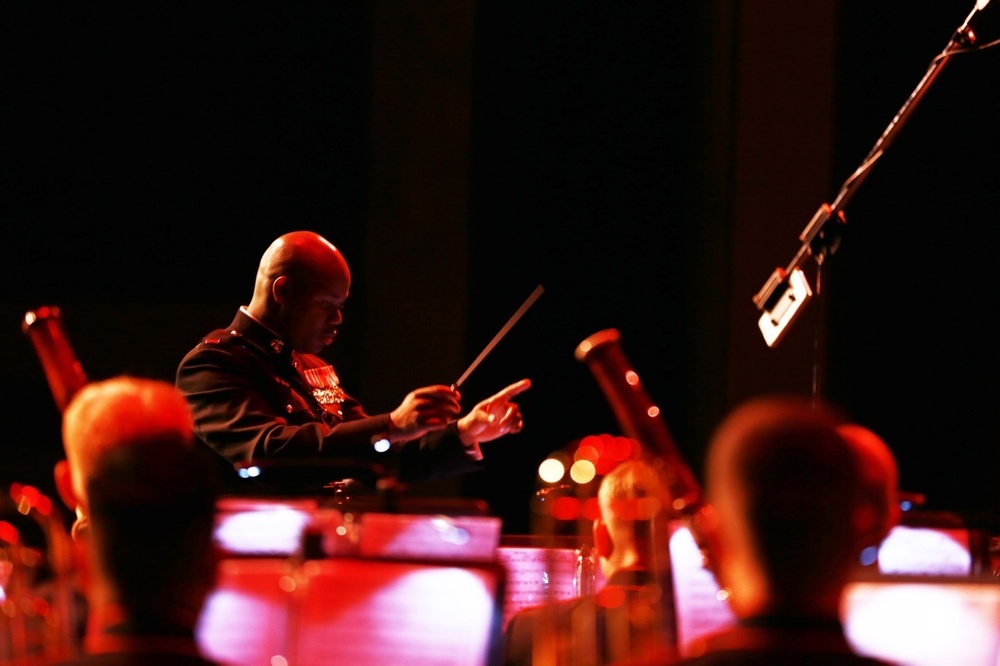 Division band member entertains at home, defends abroad