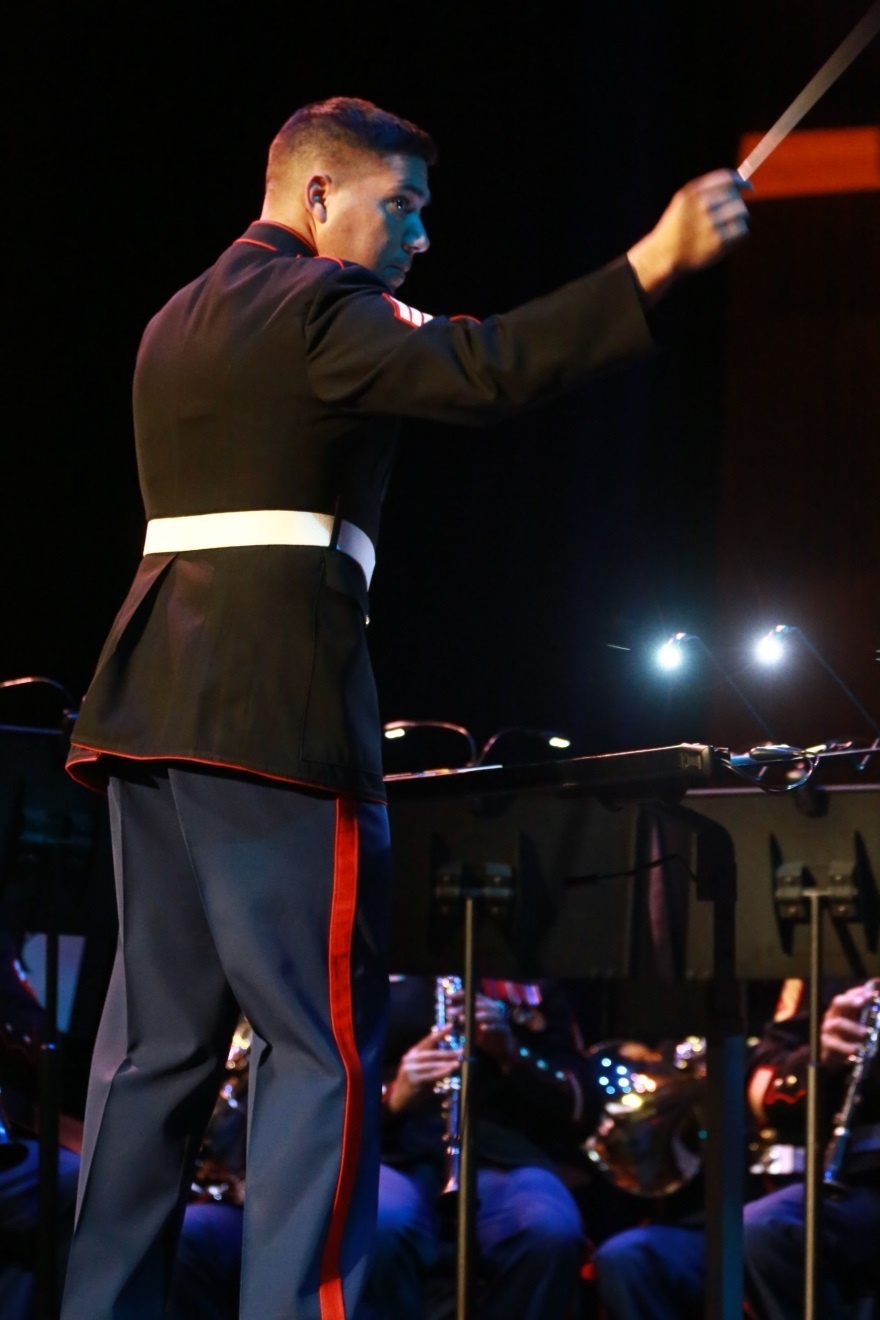 Division band member entertains at home, defends abroad
