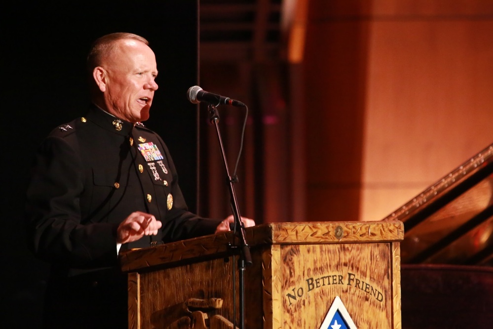 Division band member entertains at home, defends abroad