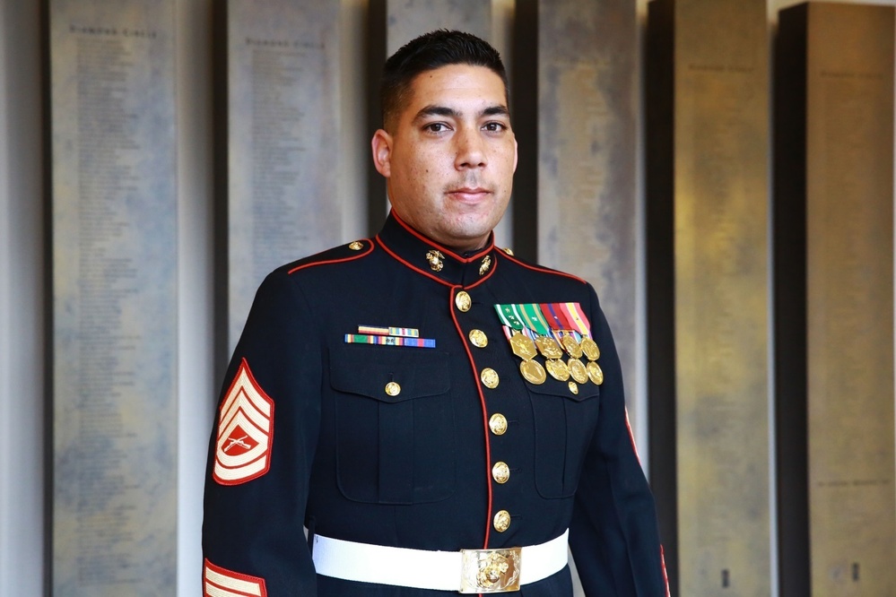 Division band member entertains at home, defends abroad