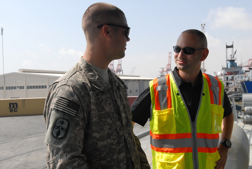 Command Sgt. Maj. Barja with the 371st Sus. Bde. tours cargo operations in Southwest Asia.
