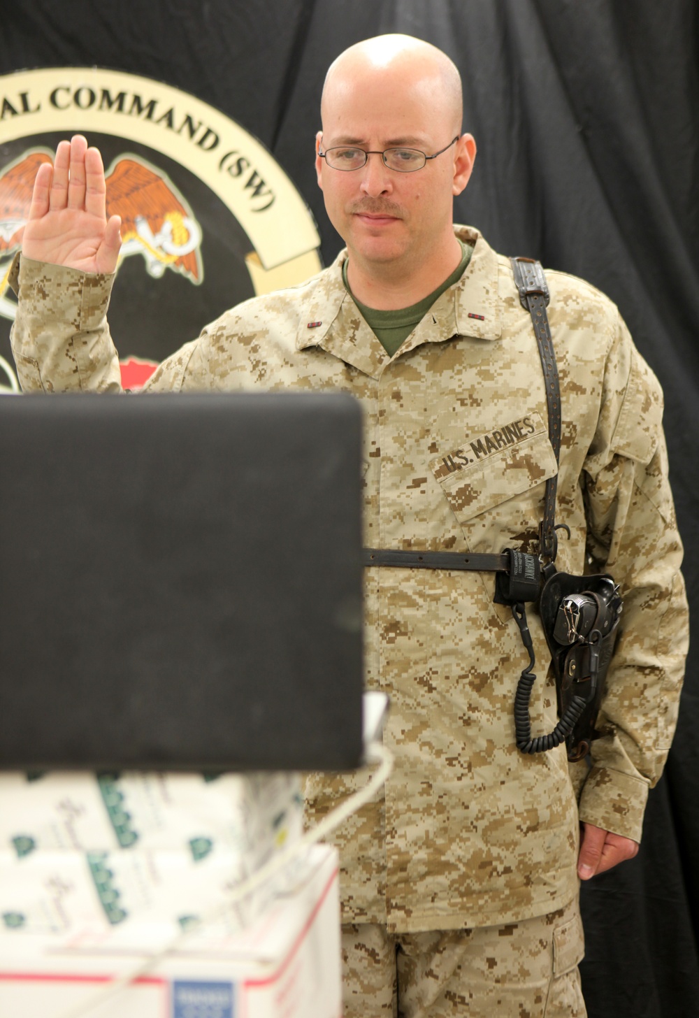 Marine administers Oath of Enlistment to son via webcam from Afghanistan