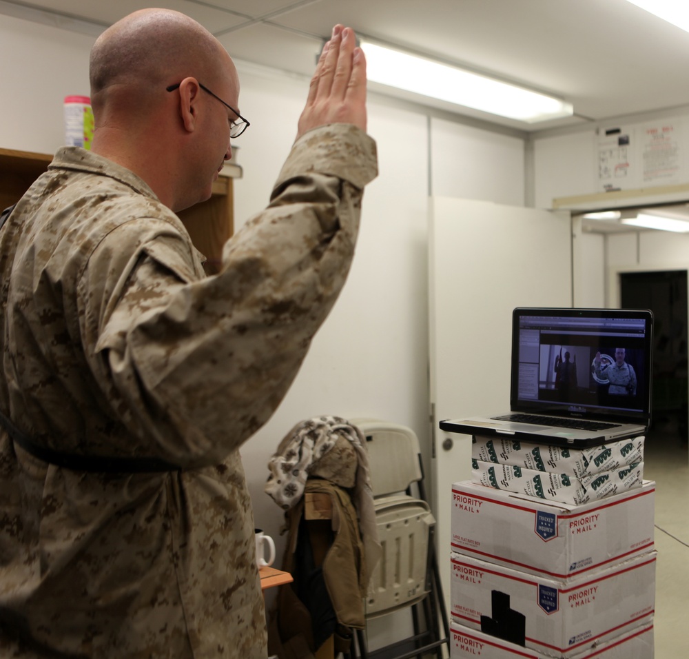 Marine administers Oath of Enlistment to son via webcam from Afghanistan