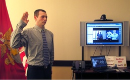 Marine administers Oath of Enlistment to son via webcam from Afghanistan