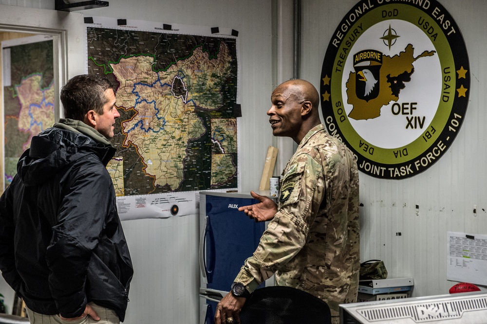 Ravens head coach John Harbaugh visits troops in Afghanistan