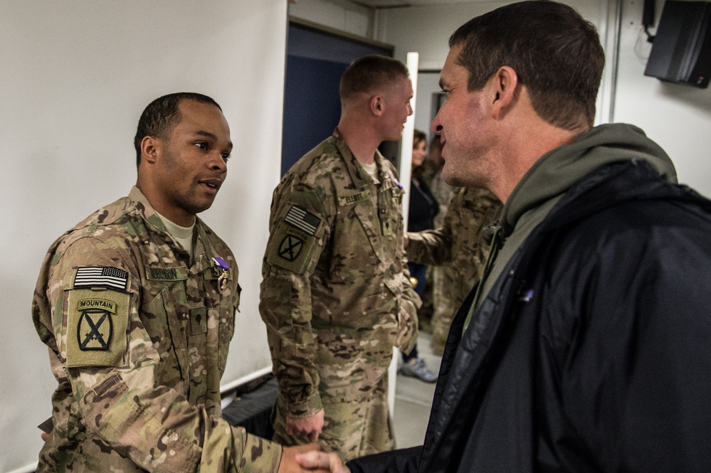 Ravens head coach John Harbaugh visits troops in Afghanistan