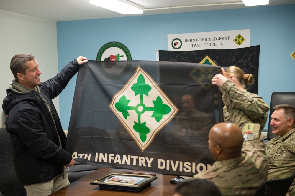 Ravens head coach John Harbaugh visits troops in Afghanistan