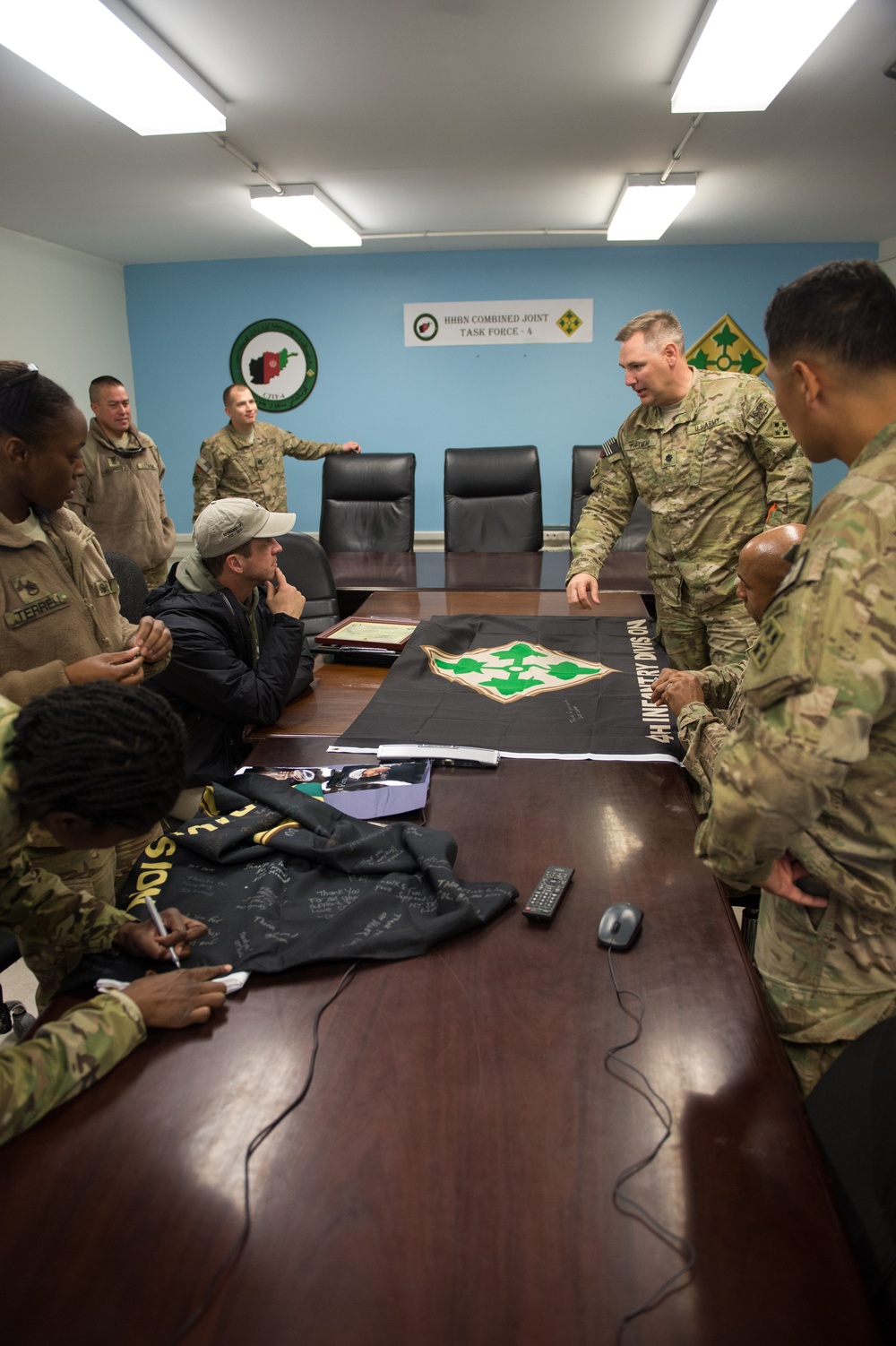 Ravens head coach John Harbaugh visits troops in Afghanistan