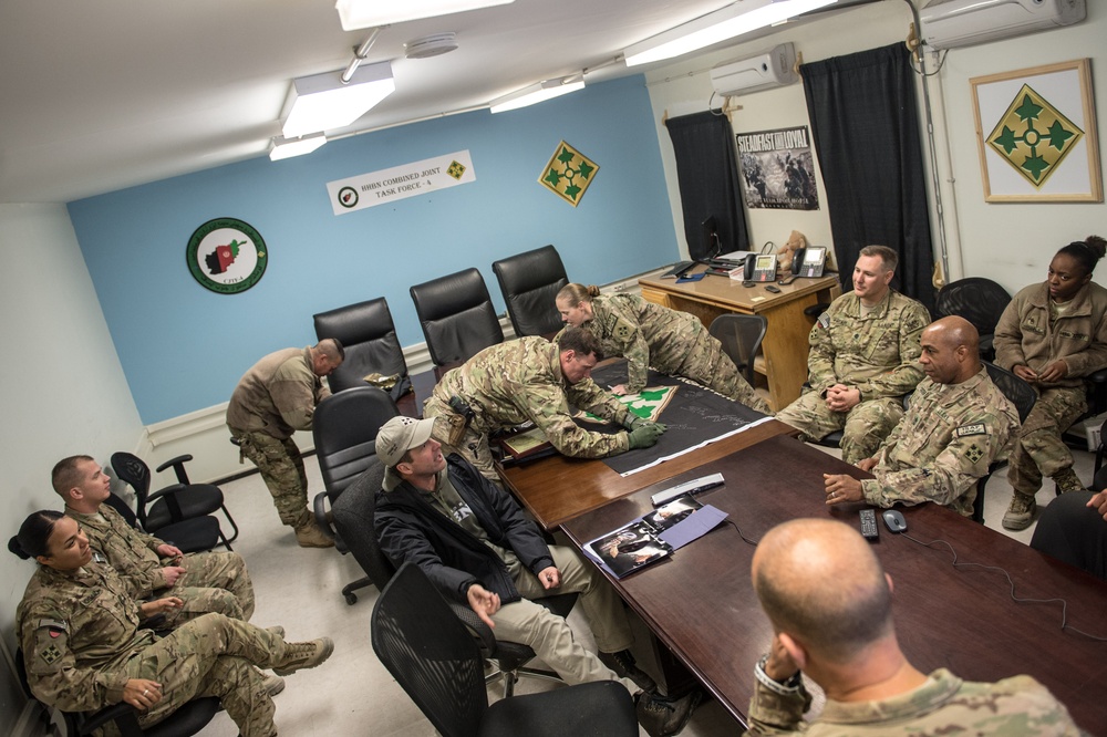 Ravens head coach John Harbaugh visits troops in Afghanistan