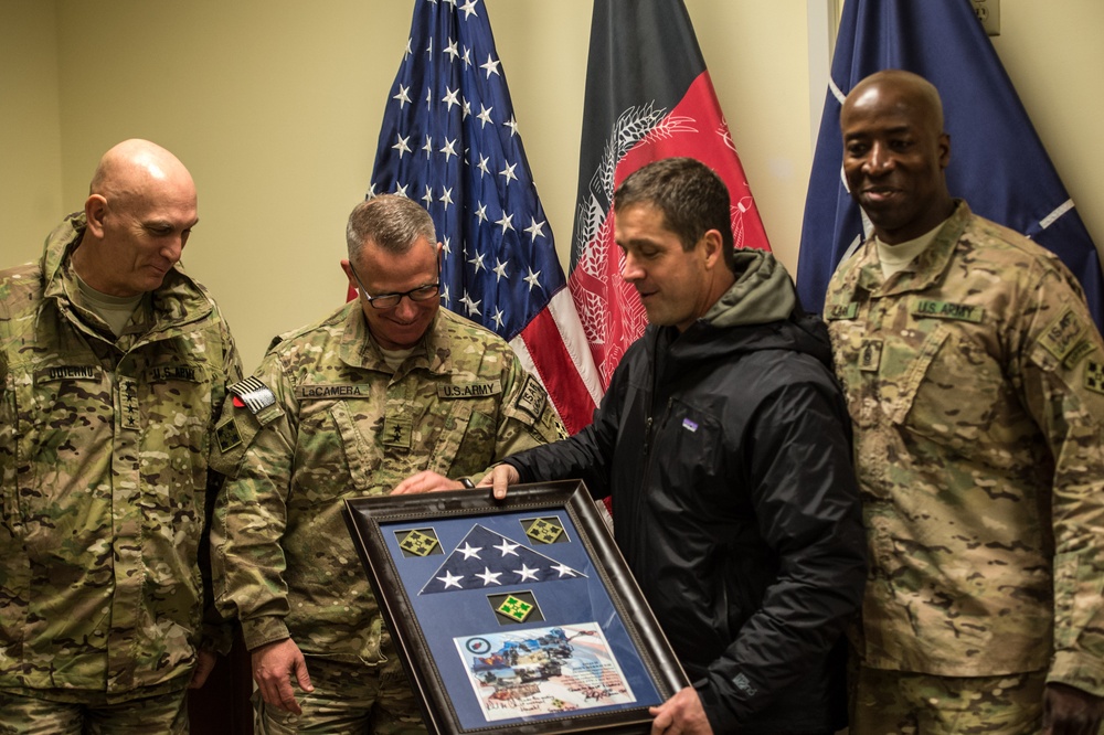 Ravens head coach John Harbaugh visits troops in Afghanistan