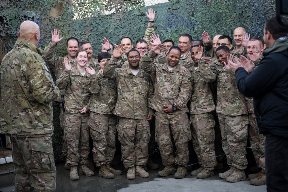 Ravens head coach John Harbaugh and Army Chief of Staff visit with troops in Afghanistan