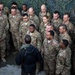 Ravens head coach John Harbaugh visits with troops in Afghanistan