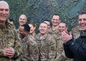 Ravens head coach John Harbaugh, and Army Chief of Staff visit with troops in Afghanistan