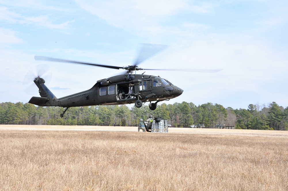 Virginia Guard aviators conduct sling load training with AIT students