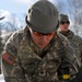 Spc. Dante Stumpo attaches a 81mm sight
