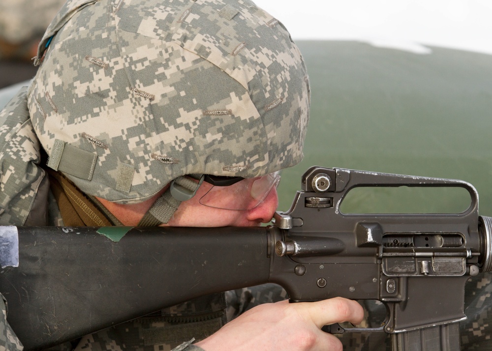 Utah reservist fires rifle during Best Warrior Competition
