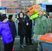 Lunar New Year volunteers deliver rice, friendship