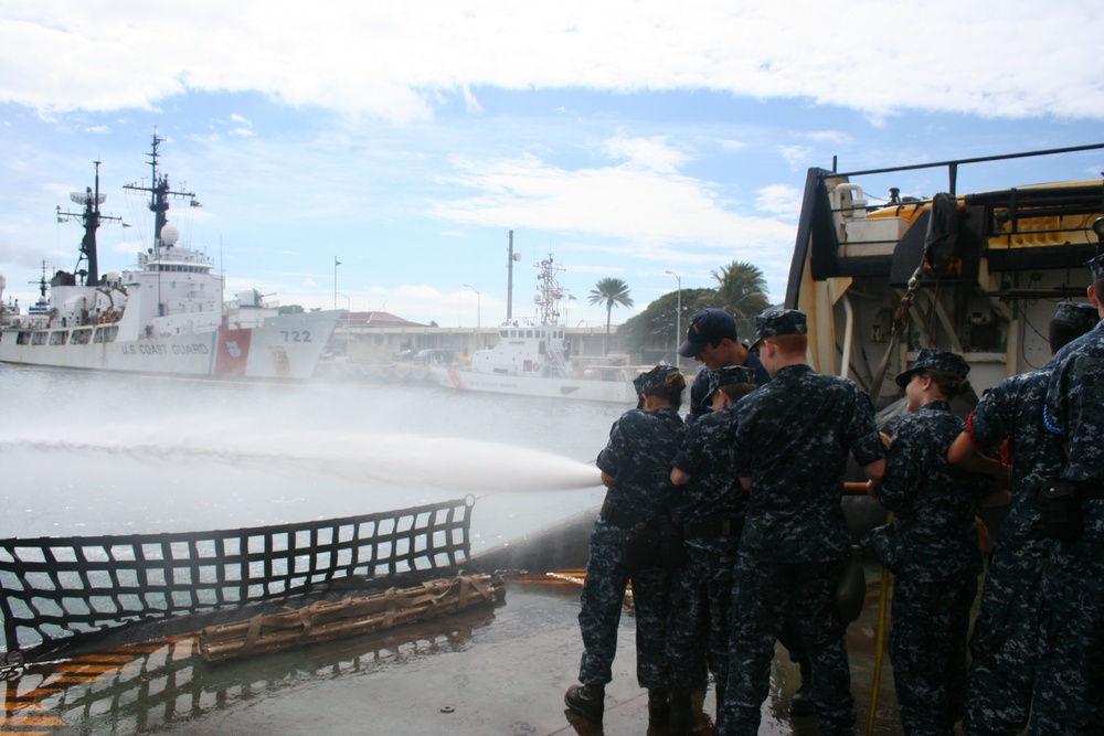 Sea cadets learn about firefighting aboard Coast Guard cutters