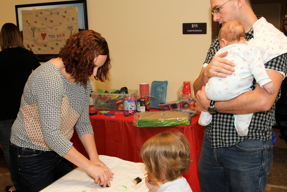 Families decorate pillows for deployed 2 Fury paratroopers