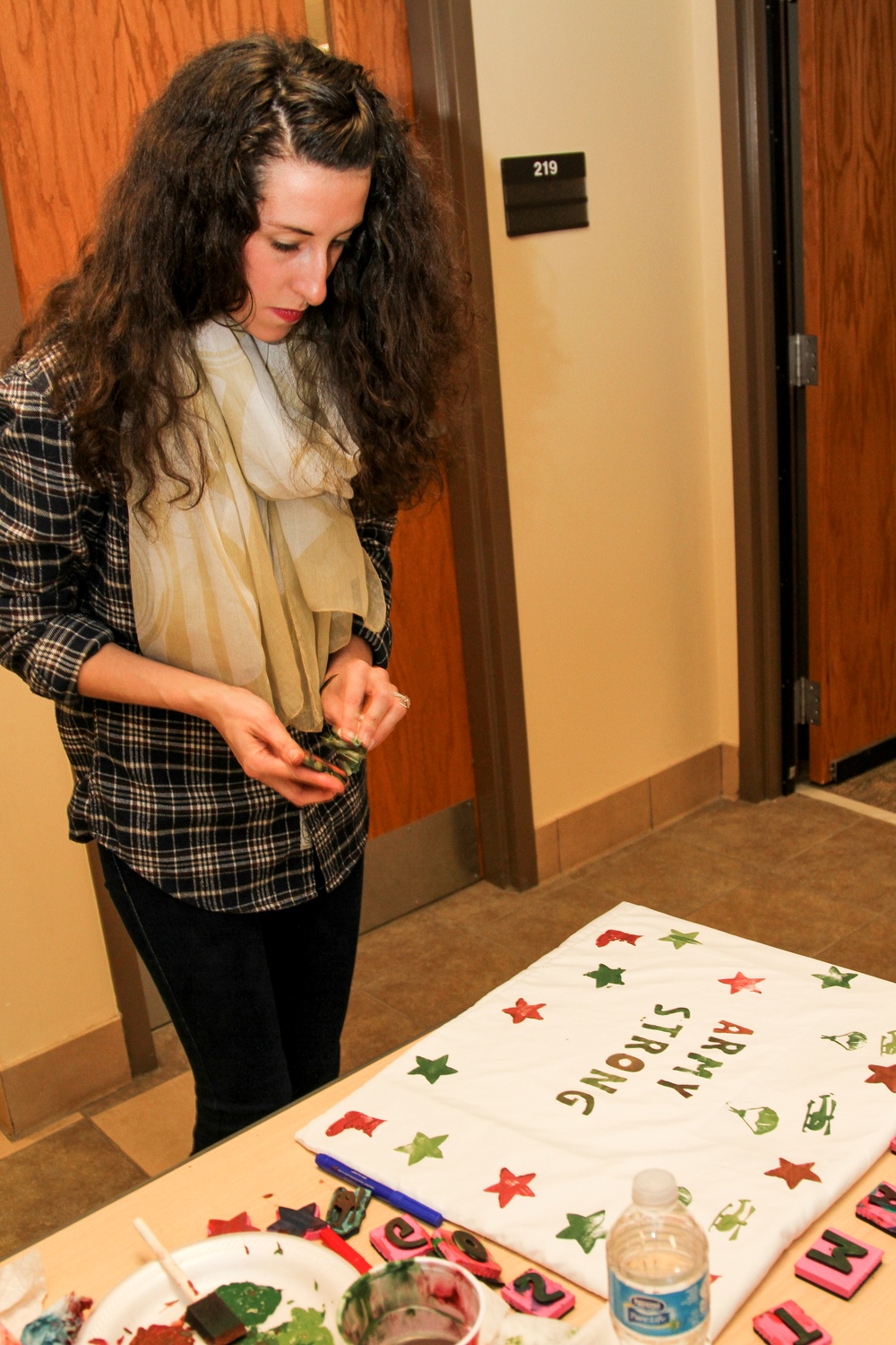 Families decorate pillows for deployed 2 Fury Paratroopers