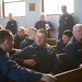 Coast Guard shipmate discussions prior to the Boat Forces Reserve Management Project Presentation