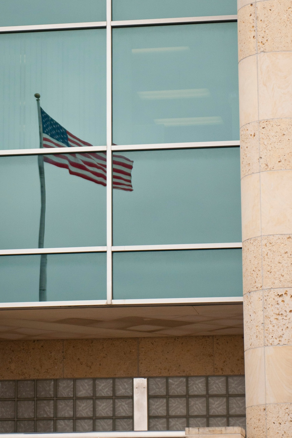 Old Glory reflected in III Corps headquarters