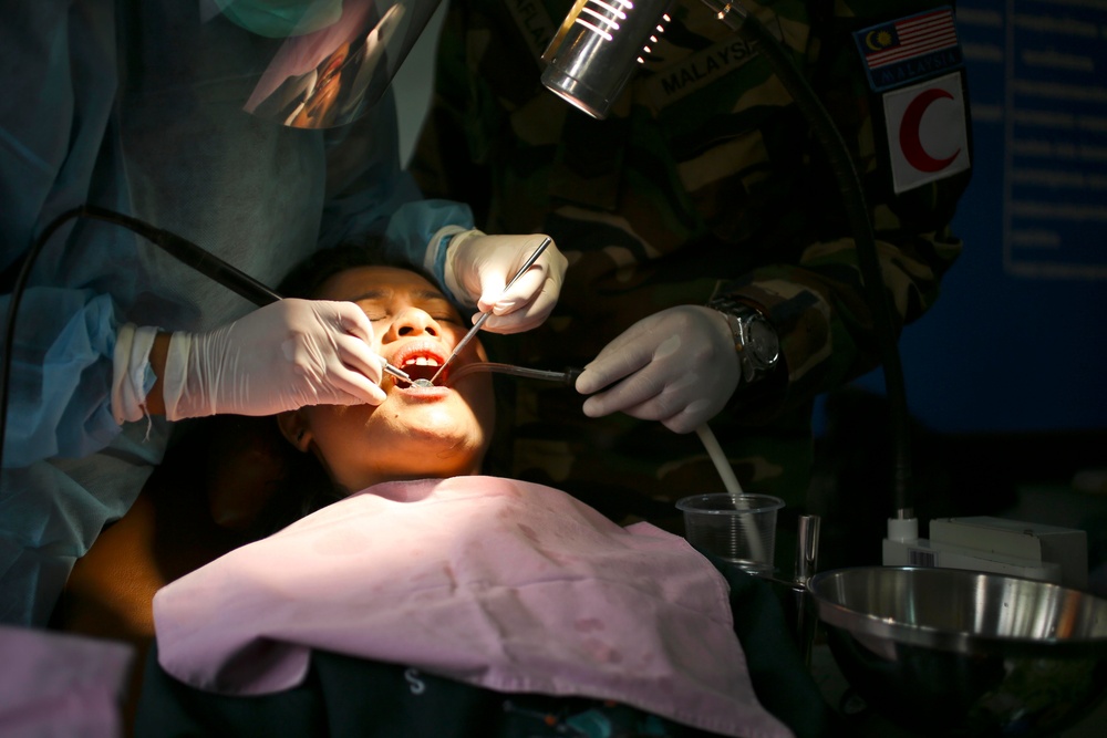 Thai children, families receive medical care during Cobra Gold 2014