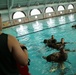 Photo Gallery: Marine recruits jump boots first into water survival training on Parris Island