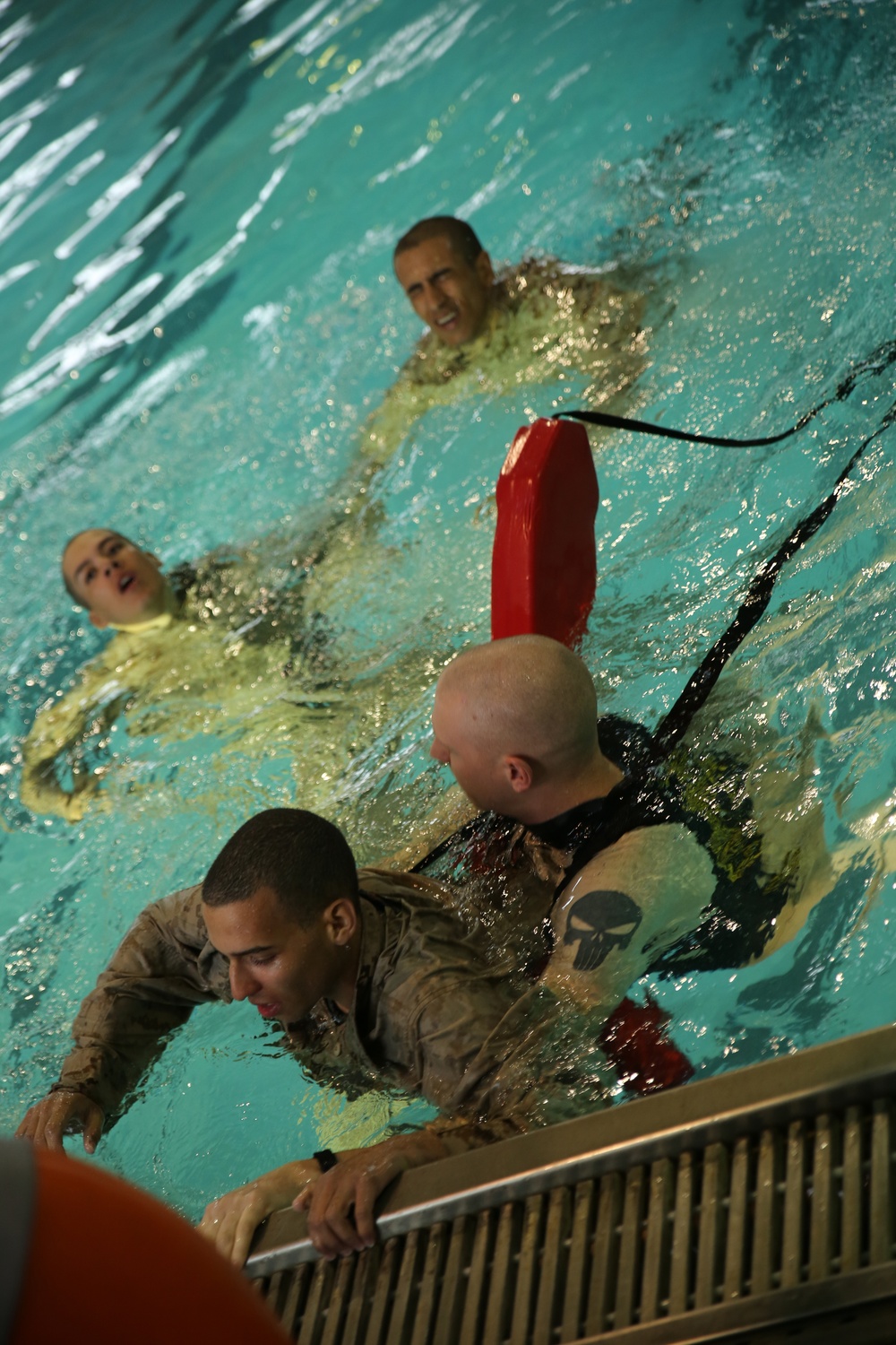 Photo Gallery: Marine recruits jump boots first into water survival training on Parris Island