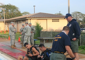 Divers from Coast Guard Cutter Kukui