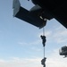 Marines fast-rope from an MV-22 Osprey