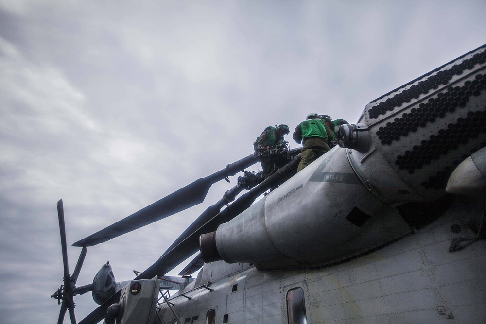 VMM-263 Marines maintain aircraft on USS Bataan flight deck