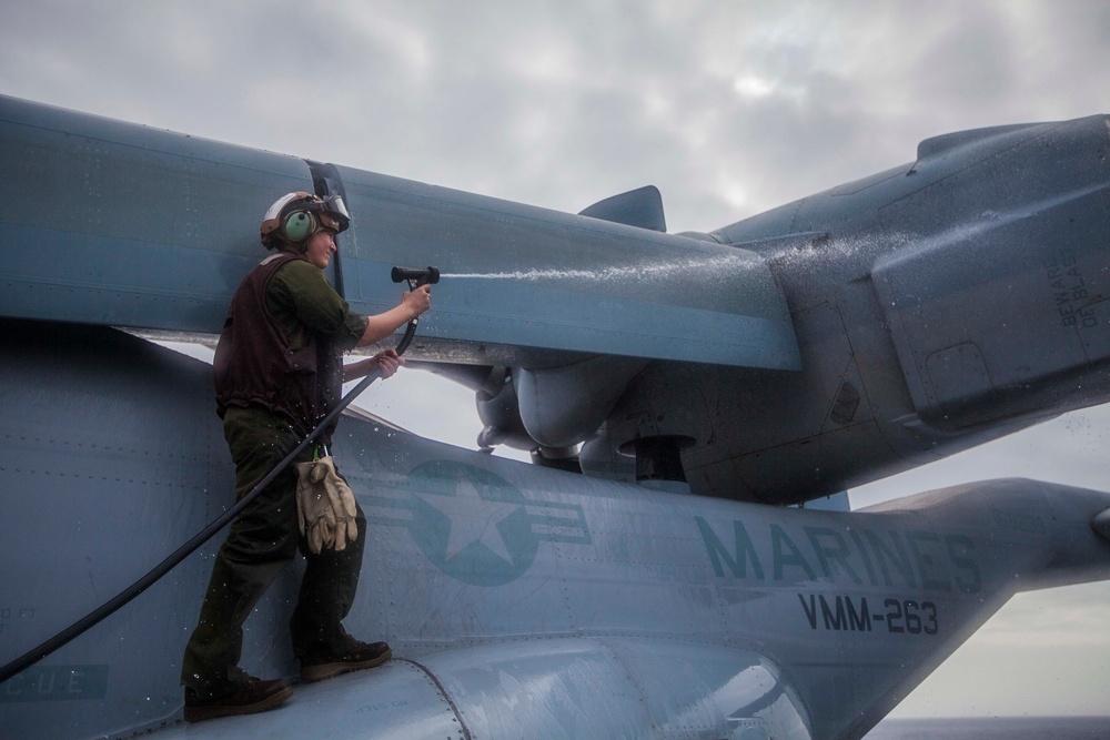 VMM-263 Marines maintain aircraft on USS Bataan flight deck