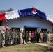 Students, locals celebrate new school built by service members during CG14