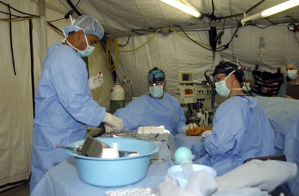 321st Expeditionary Medical Group surgeon prepares to perform surgery
