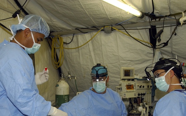 321st Expeditionary Medical Group surgeon prepares to perform surgery