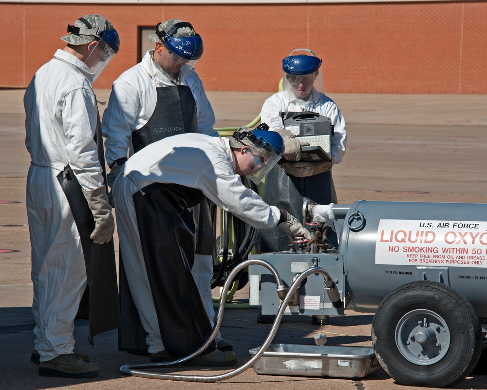 362nd Training Squadron transfers liquid oxygen to an LOX reservoir