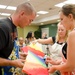 Couples build community, complementing canvases