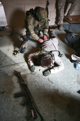 Republic of Georgia soldiers conduct cordon and search operation during rehearsal exercise