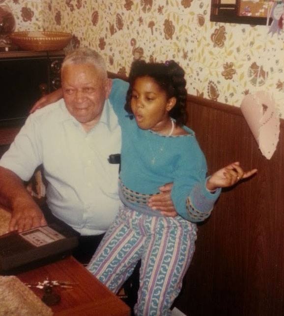 Chief Anderson Executive Director Christina Anderson as a child with grandfather Tuskegee Airman Chief Anderson