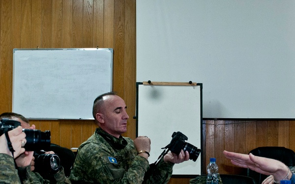 MNBG-E public affairs soldiers educate multinational counterparts in photography