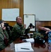MNBG-E public affairs soldiers educate multinational counterparts in photography